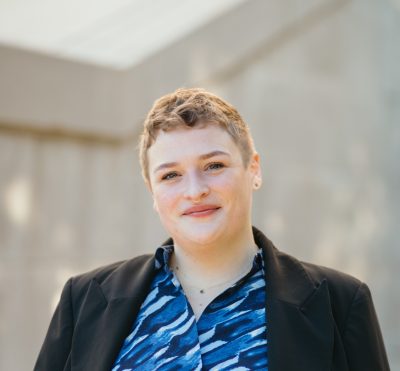 Kendall in black blazer and blue shirt